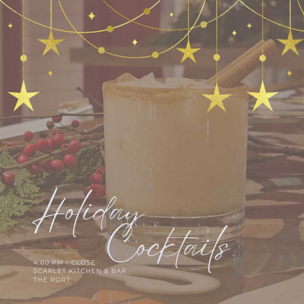 Festive Holiday Cocktail with cinnamon stick and holly