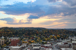 sky, fall colored trees, downtown